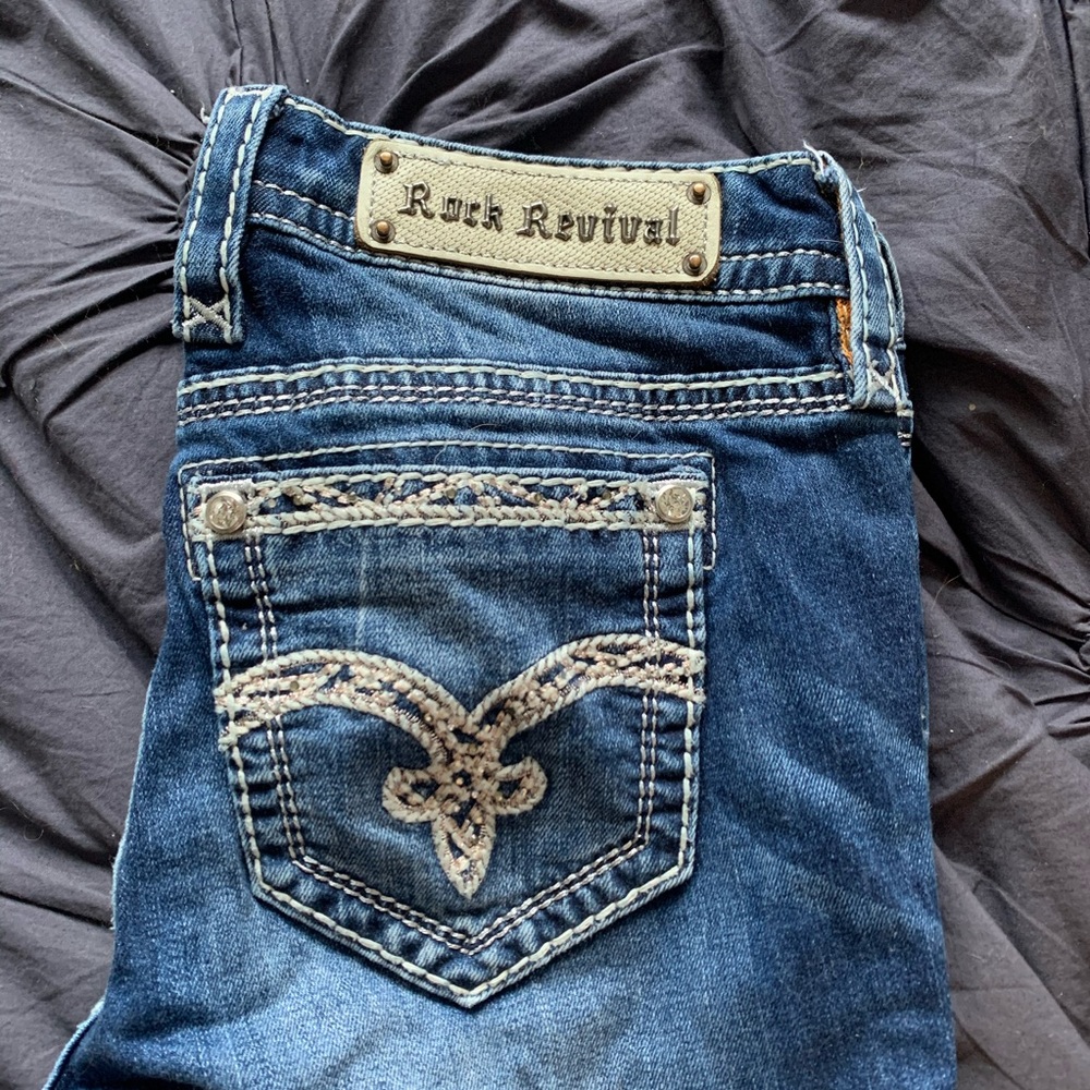 Size 28 Mid-rise boot cut Rock Revivals